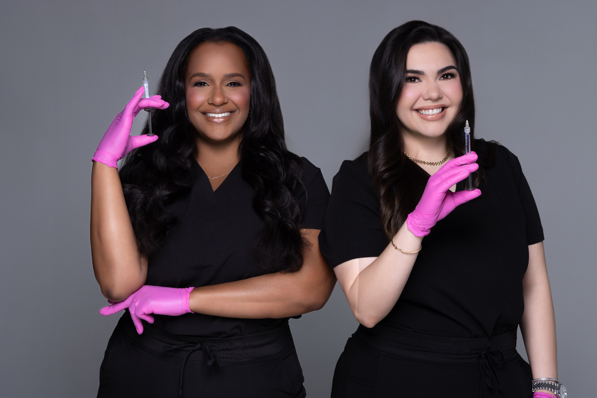 Nayah and Evelyn, co-founders of SkinRx, at the front desk